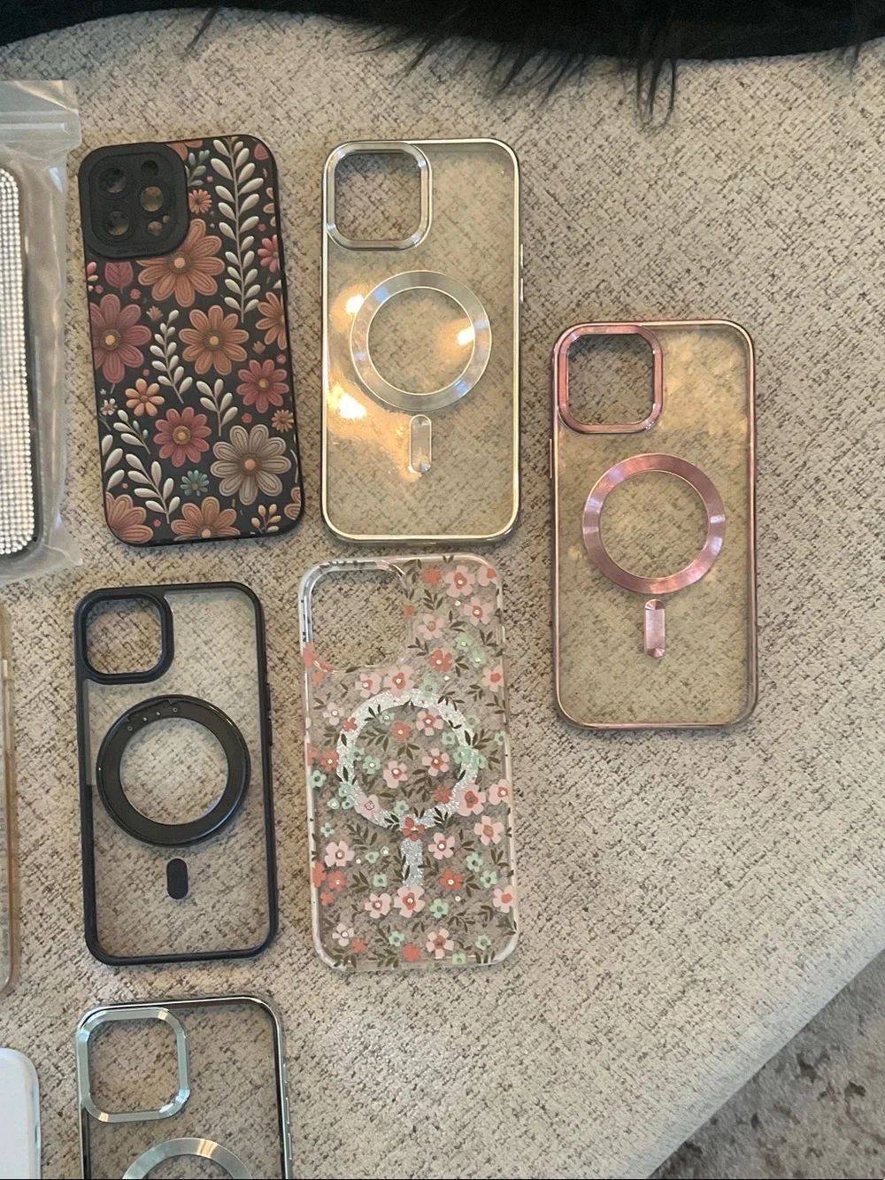 Assorted IPhone 12 Pro Max Phone cases and Screen Protectors